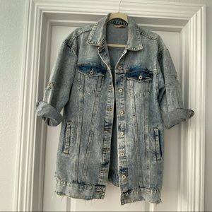 On trend oversized distressed denim jacket
